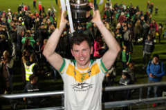 Conor-Doyle-raises-the-Intermediate-Championship-Cup