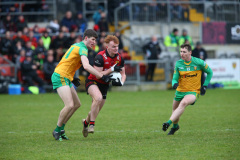 GAA-DOWN-v-DONEGAL-Downs-Danny-Magill-keeps-possession-while-under-presure
