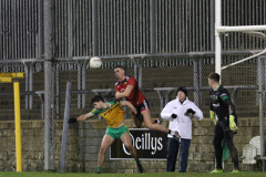 GAA-DOWN-v-DONEGAL-Pat-Havern-goes-airborn-as-he-trys-to-win-the-ball