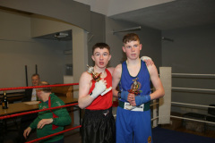 BOXING-St-Bronaghs-ABC-winner-Adam-Daly-All-Blacks-red-top-with-his-opponnent-CillianFitzpatrick-eastdown