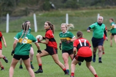 Rostrevors-Eimear-Toal-is-closed-down-by-Bryansfords-players-Holly-Smyth-6-and-Kirsty-Fitzpatrick-2
