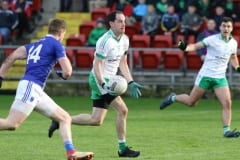 Burrens-Conaill-McGovern-drives-forward-with-the-ball