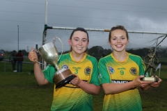 Ballyholland-Captain-Caoimhe-Byrne-holding-the-Intermediate-Championship-Cup-and-player-of-match-Silin-Murphy