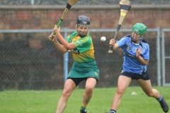 Ballyhollands-Jennifer-Devine-clearing-her-lines-as-Grace-Cunningham-attempts-to-block