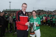 Down-Ladies-Official-Francis-Rogan-presents-the-Intermediate-Championship-Cup-to-Saval-Captain-Michelle-Kearney