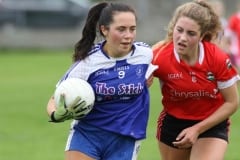 Loughinislands-Maria-Nixon-taking-on-Dundrums-Cliodhna-Carey-in-the-Ladies-Junior-Final