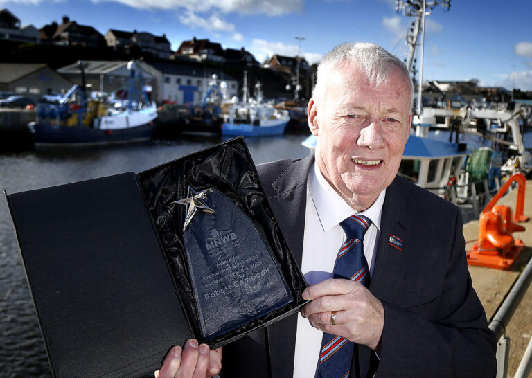 ROBERT DELIGHTED TO RECEIVE AWARD